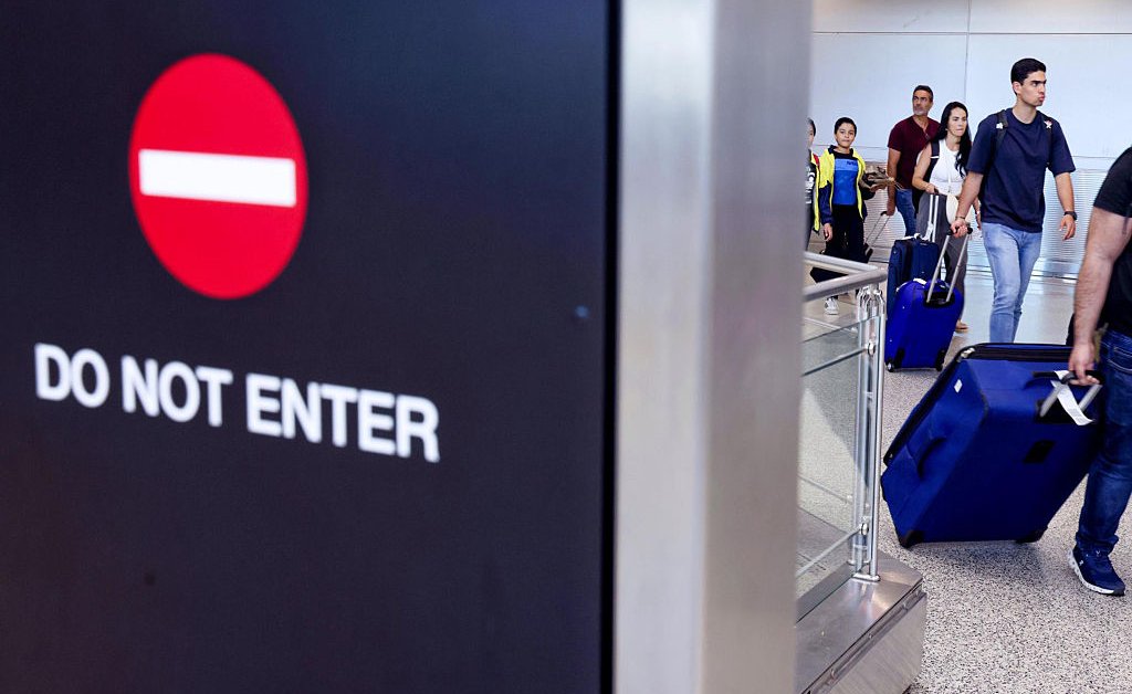 Trump expands travel ban to include five more countries and Palestinian Authority