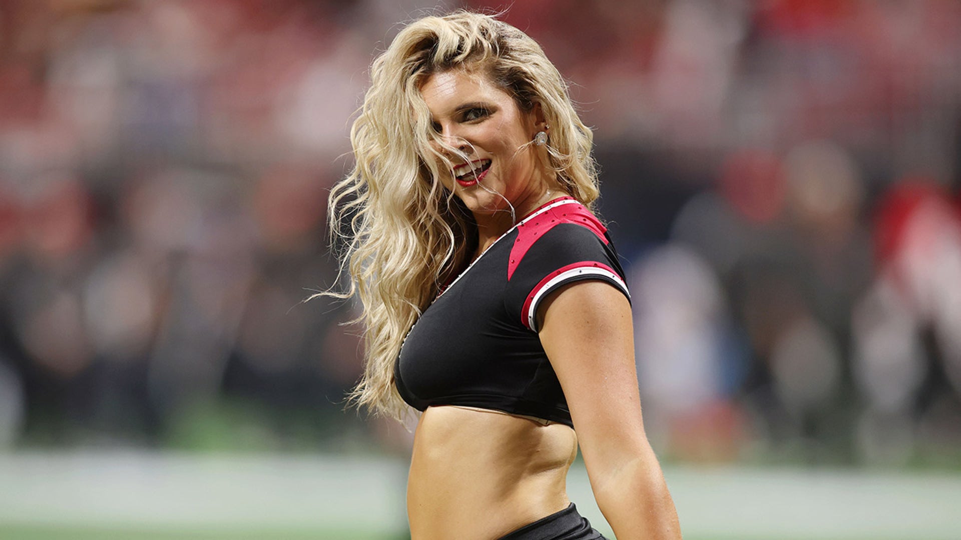 Atlanta Falcons cheerleaders come out to perform at Mercedes-Benz Stadium on Aug. 15, 2025
