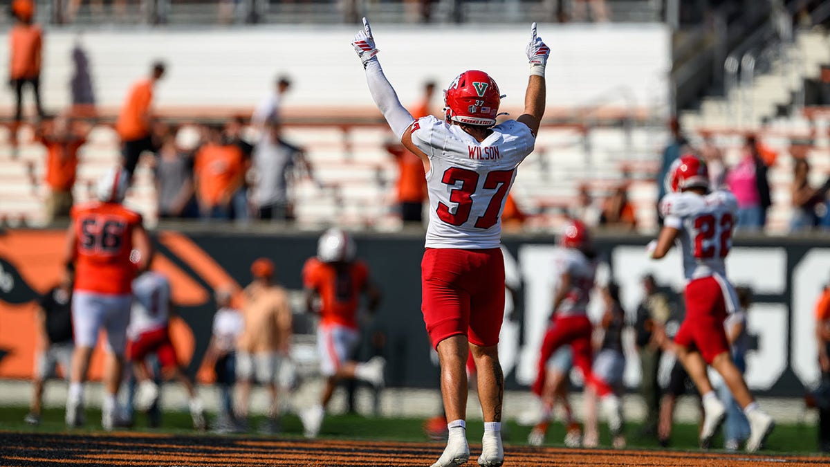 Fresno State defensive back Ryan Wilson celebrates an interception late in the fourth quarter