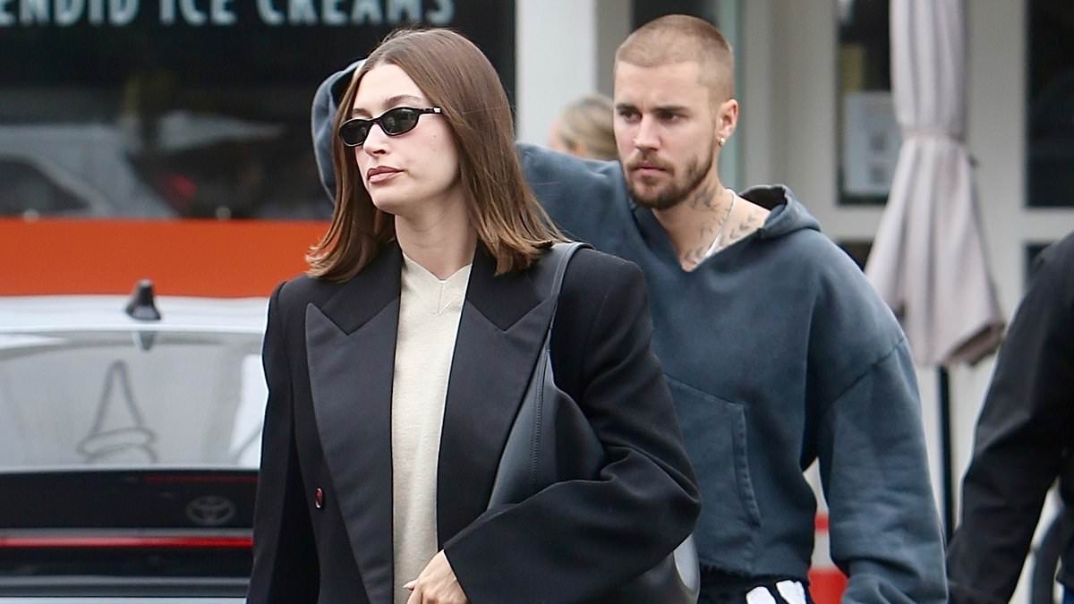 Justin and Hailey Bieber look tense at lunch after late-night holiday party amid marriage rumors