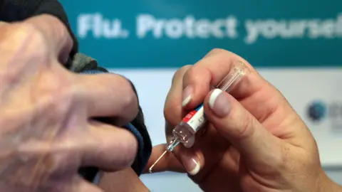 Charity says Scotland's narrower Covid booster eligibility is 'puzzling' as winter jab rollout begins