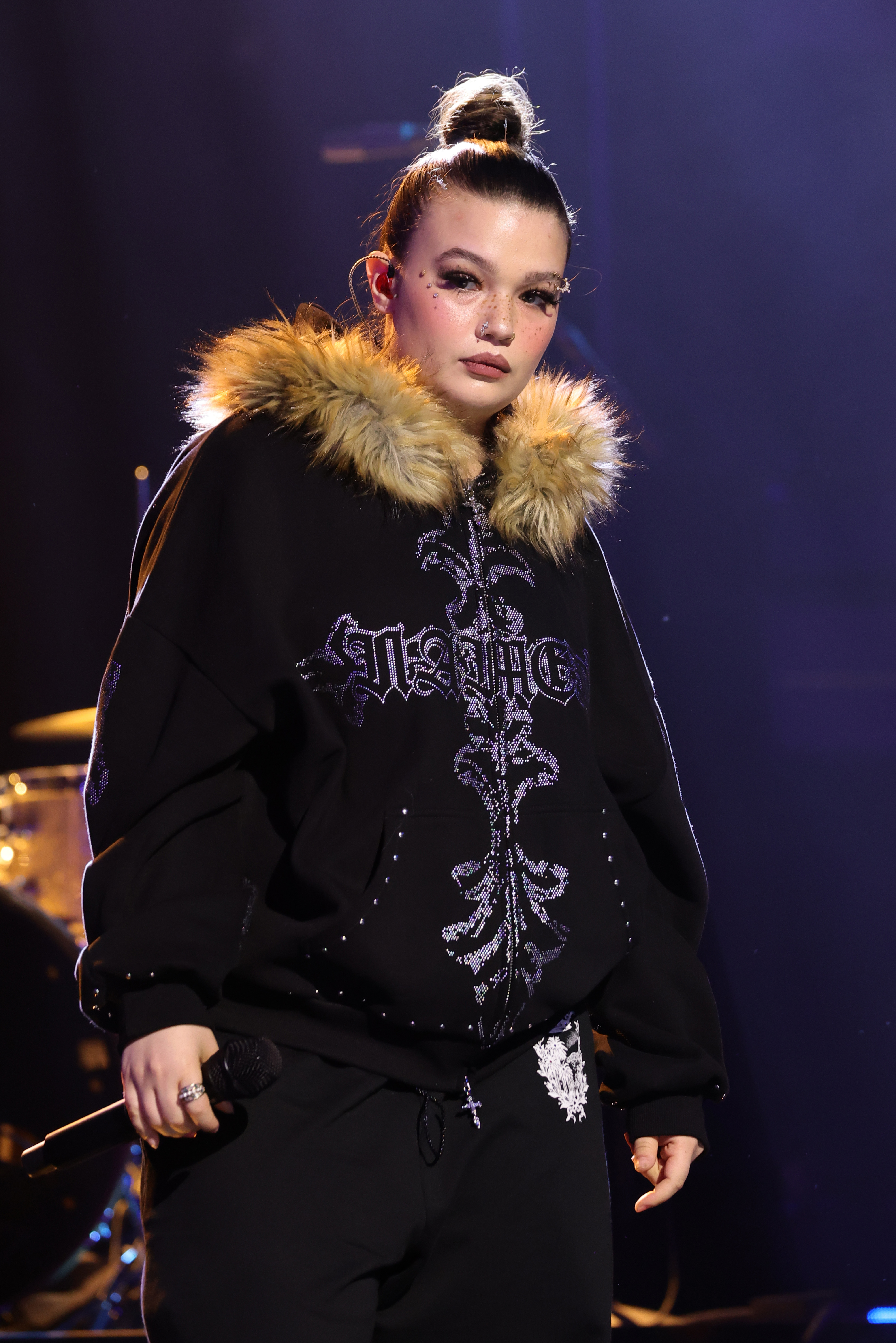 Lola Young performing in 2025