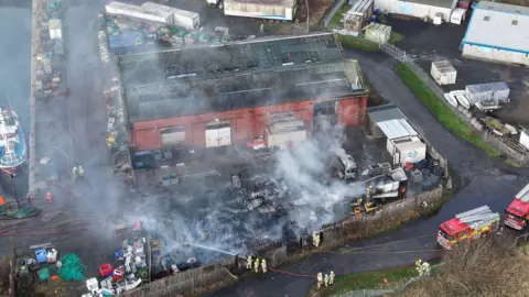 HGVs and trailers destroyed after harbour fire in Methil, Fife; police say no criminality