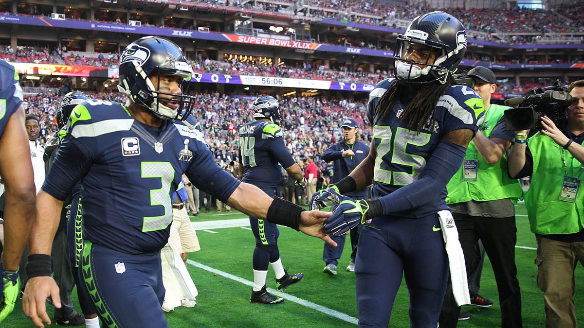 Seattle Seahawks and Russell Wilson with Richard Sherman