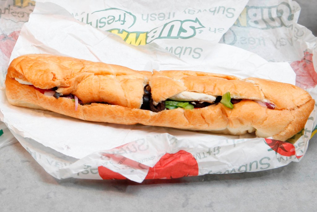 Close-up of packaged bread and sandwich shop image