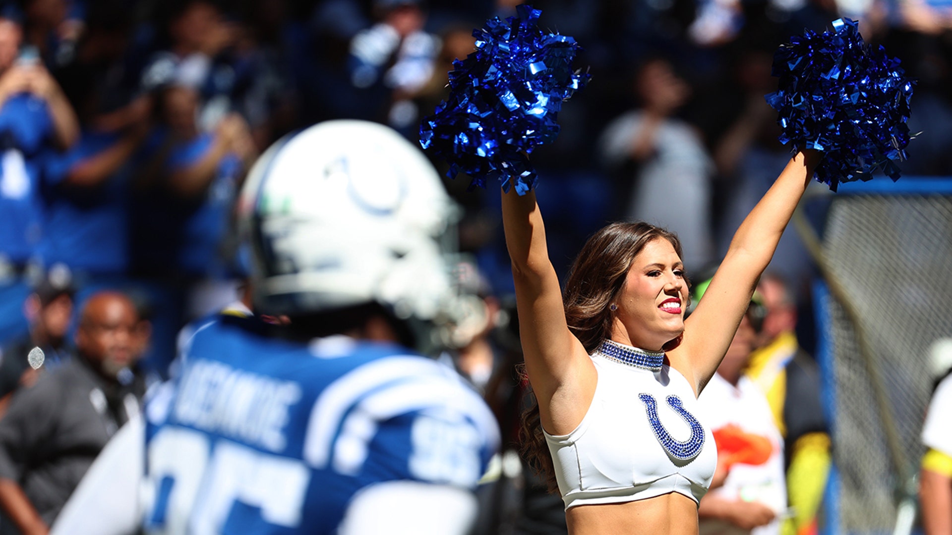 Colts cheerleaders perform during a game against the Packers