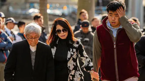 Lai's family at court