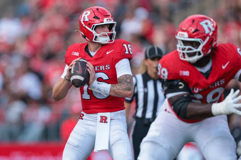 Rutgers players celebrate a rushing touchdown