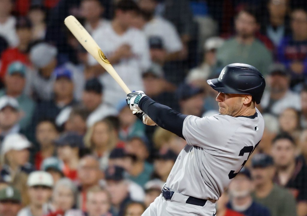 Aaron Judge celebrates with Ben Rice after scoring on his solo homer during the first inning