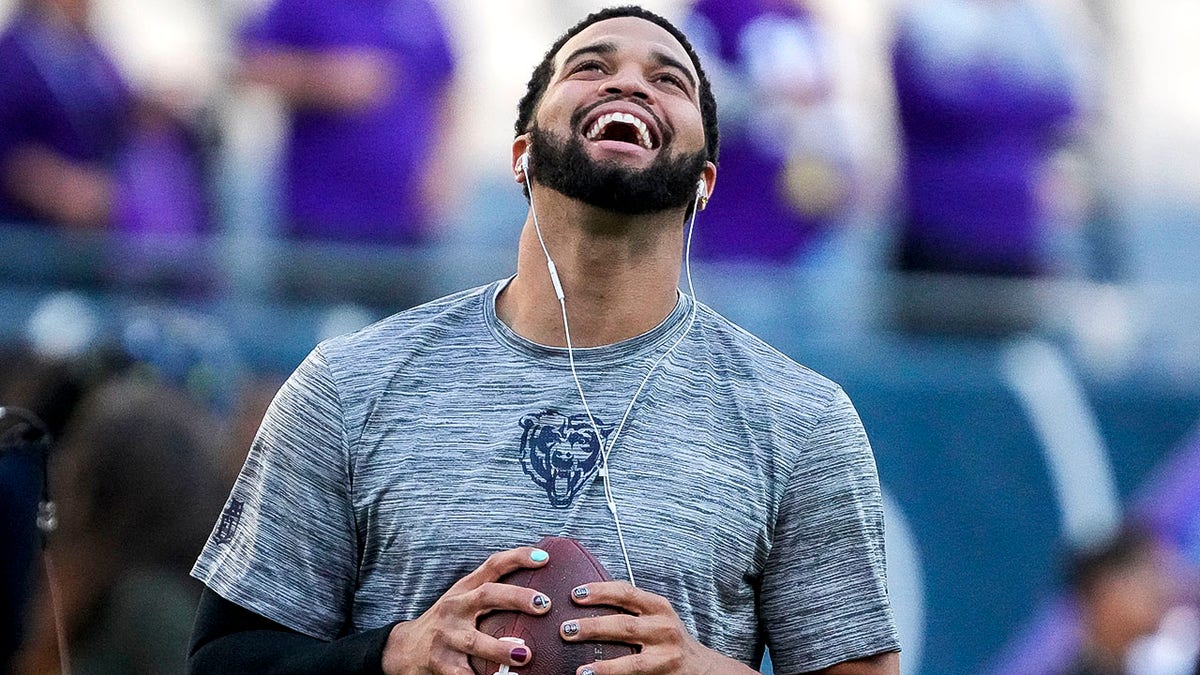 Caleb Williams warming up