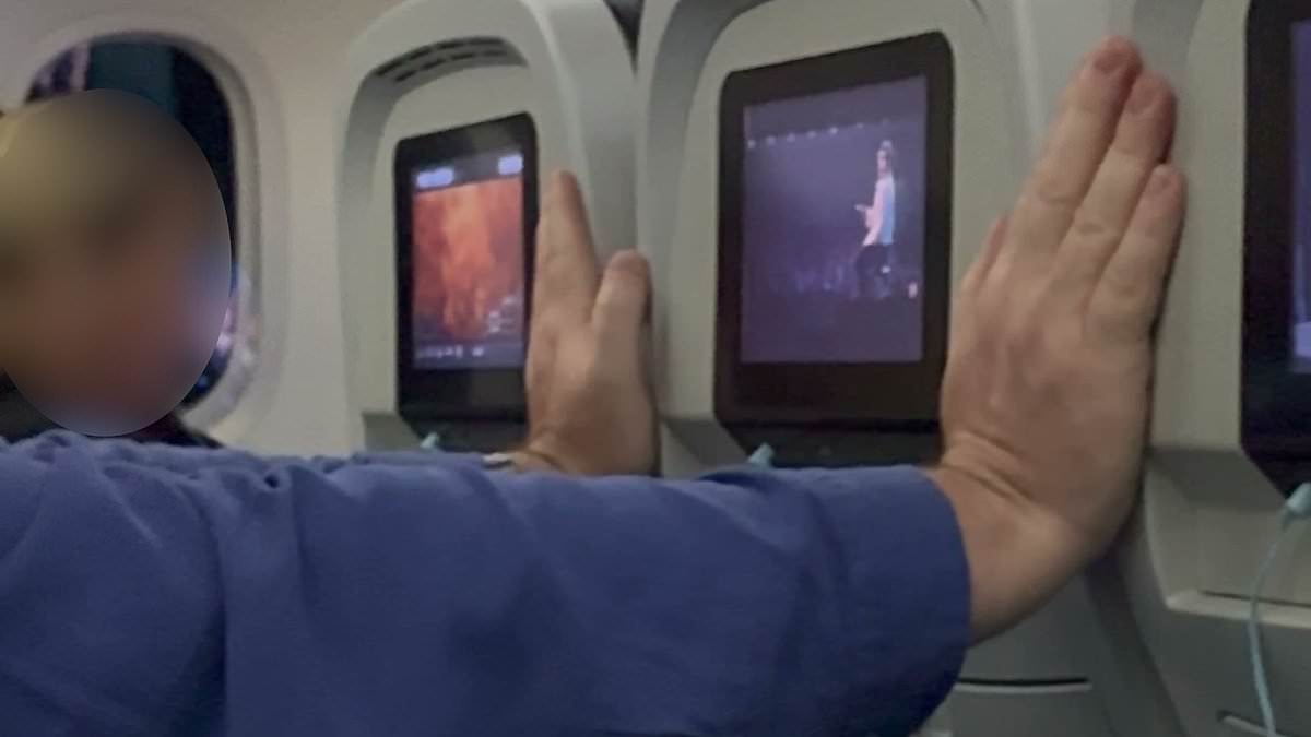 Passenger blocks seatbacks to stop front-row recline on eight-hour overnight flight