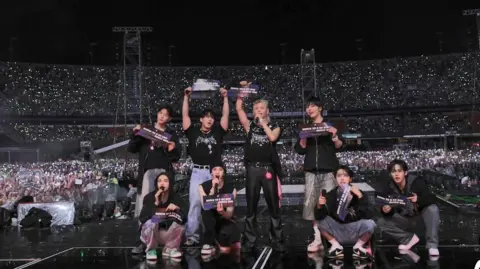 Stray Kids performing on tour