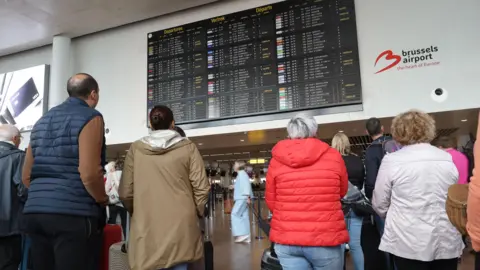 European airports face ongoing disruption after weekend cyber-attack on check-in systems