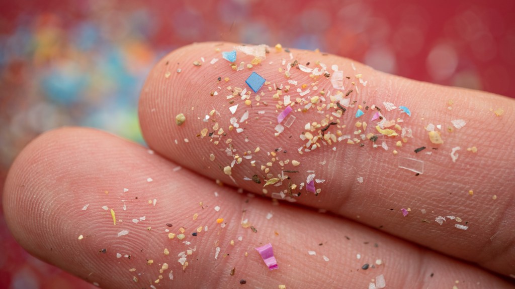 Microplastics on finger