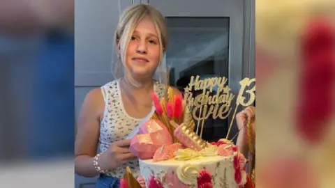 Crowd and finish-line scene at The Big Coastal Walk