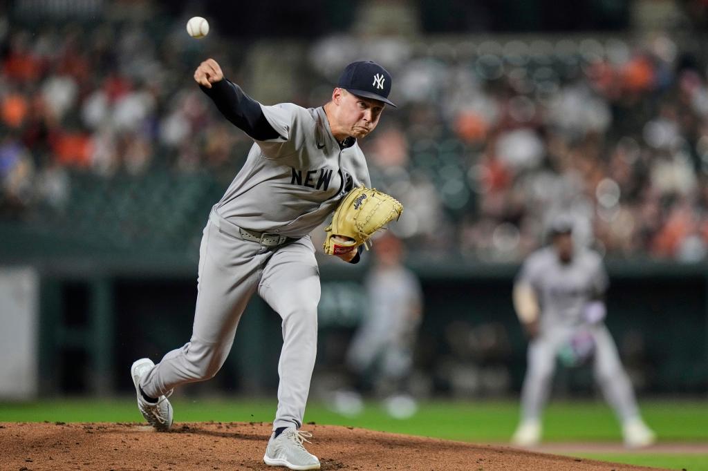 Will Warren pitches during the Yankees-Orioles game