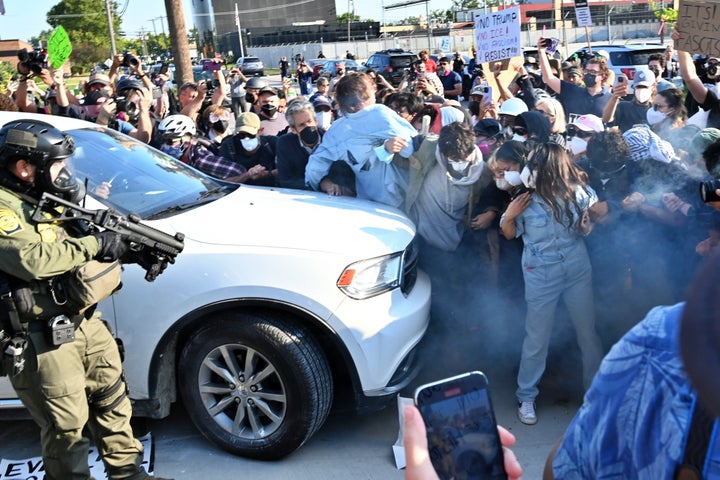 Protesters and police near a Broadview-area checkpoint