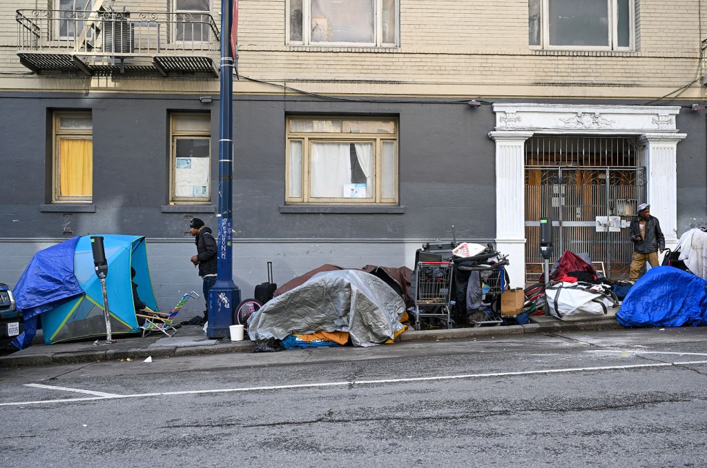 Homeless encampments along a sidewalk in San Francisco
