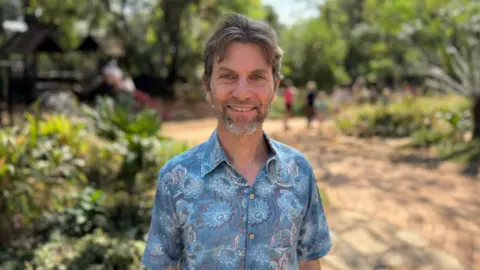 Children eat from lunchboxes filled with whole foods