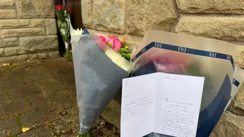 Tributes outside Hatton's home