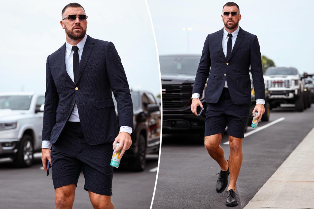 Kelce in a navy blue Thom Browne shorts suit