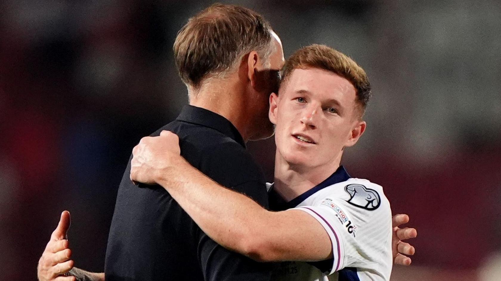 Tuchel and staff embrace after the win