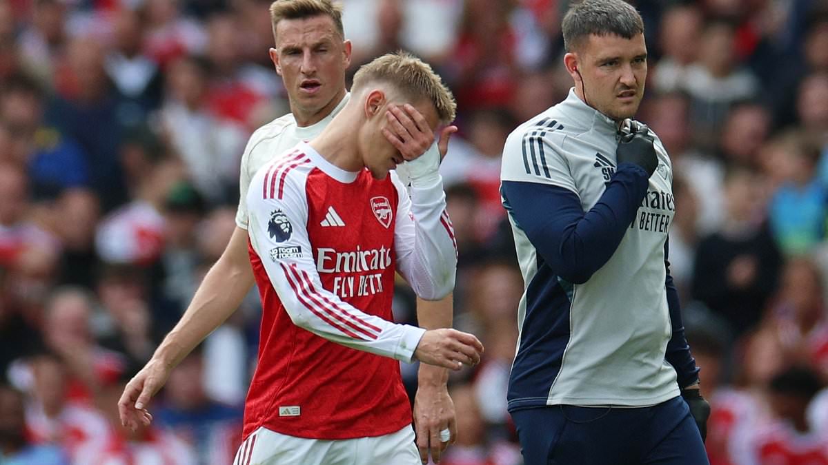 Martin Odegaard forced off with shoulder injury 17 minutes into Arsenal’s match with Nottingham Forest
