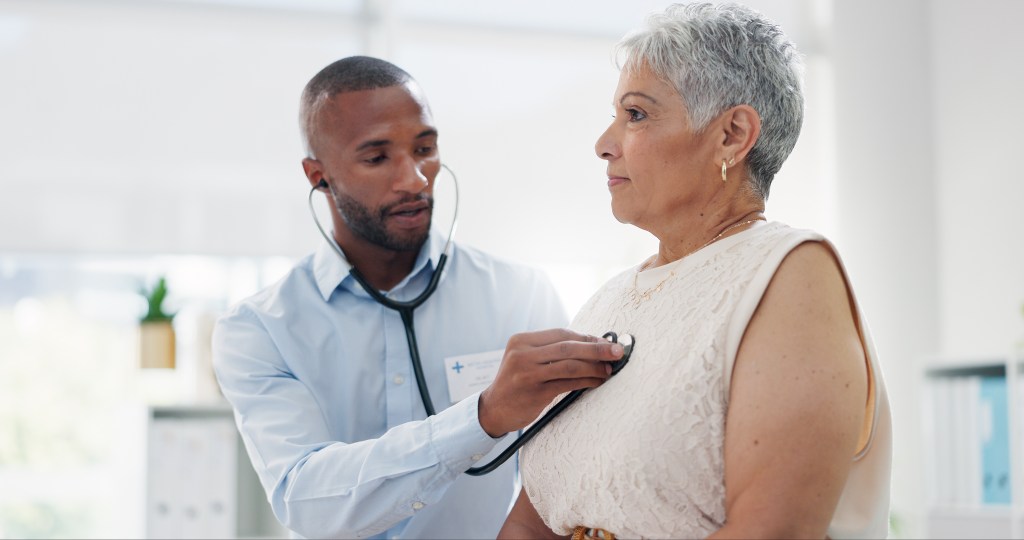 Stethoscope and doctor with senior patient