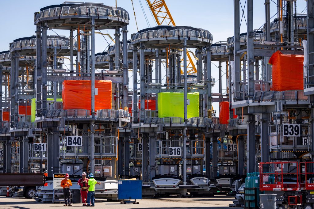 Parts of wind turbines sit at the State Pier in New London, Connecticut