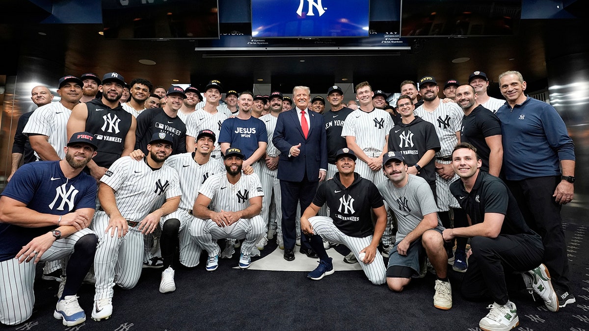 President Donald Trump with Yankees players before the game