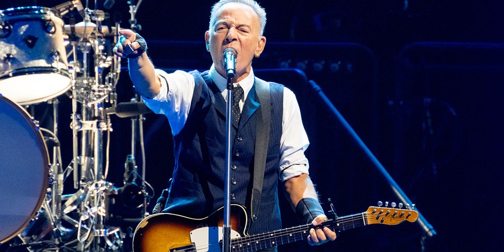 Bruce Springsteen performing on tour