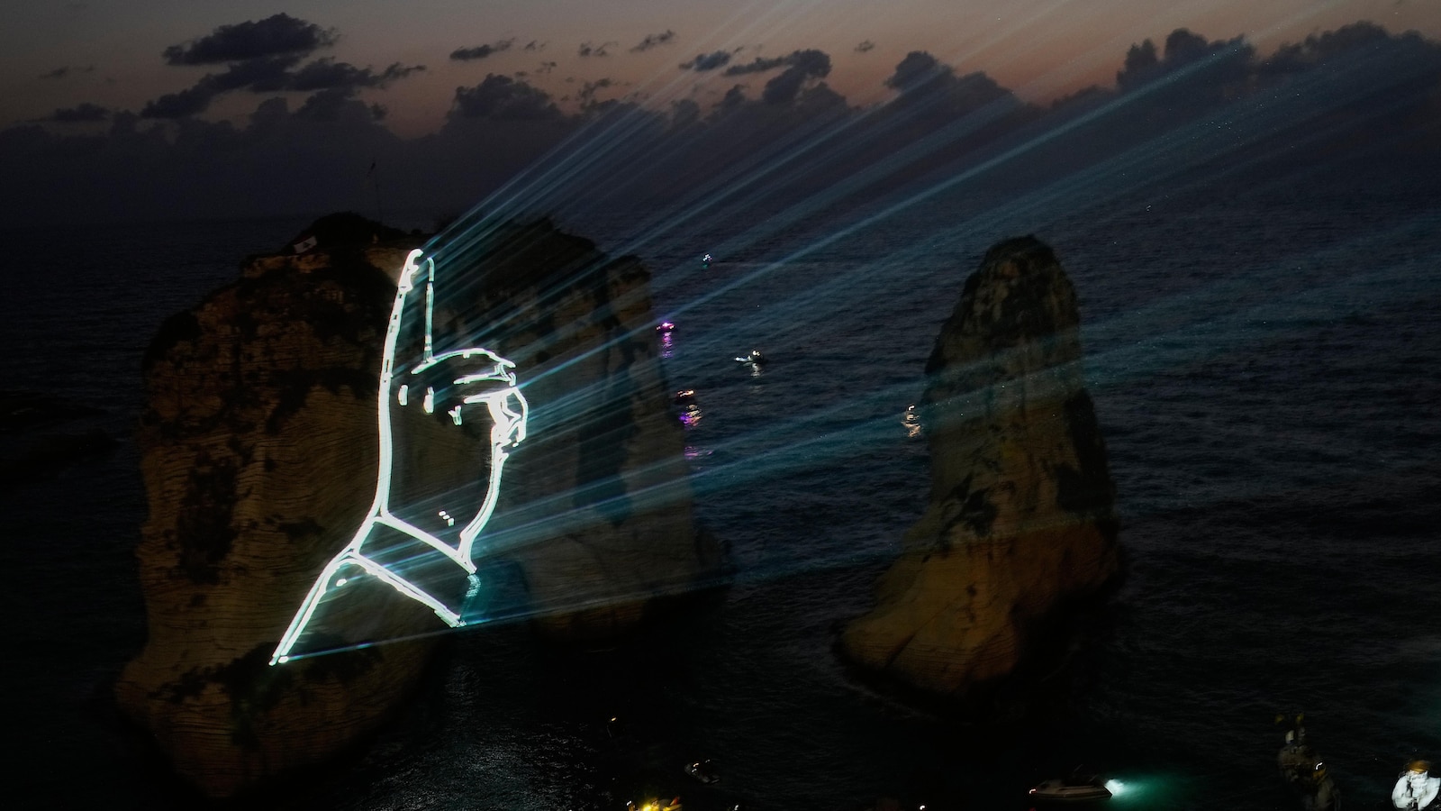 Hezbollah defies Lebanon prime minister’s ban with coastal light show honoring fallen leaders