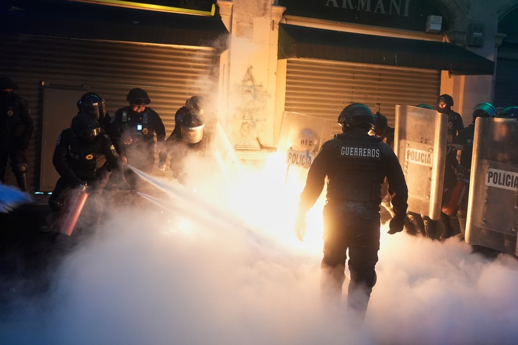 Police extinguish fire from Molotov cocktails