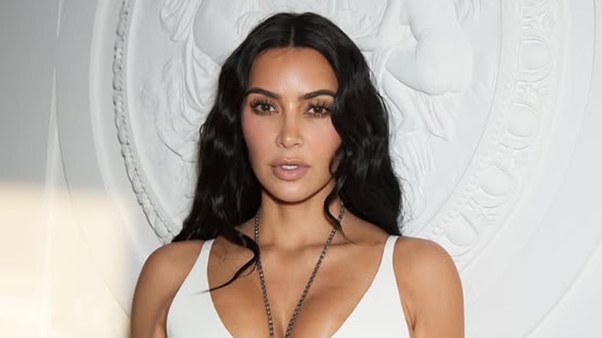 Kim Kardashian flaunts taut tummy in white two-piece during Italy getaway