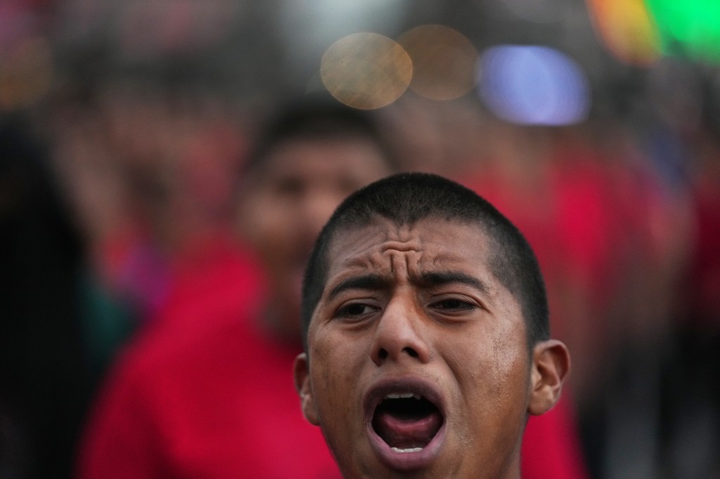 Demonstrator marching on the 11th anniversary