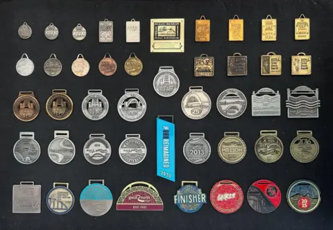 A display of Great North Run medals from past years