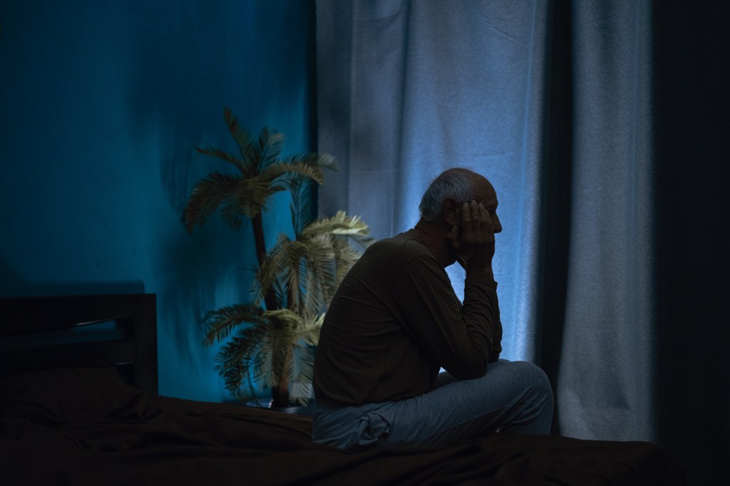 silhouette of an older man