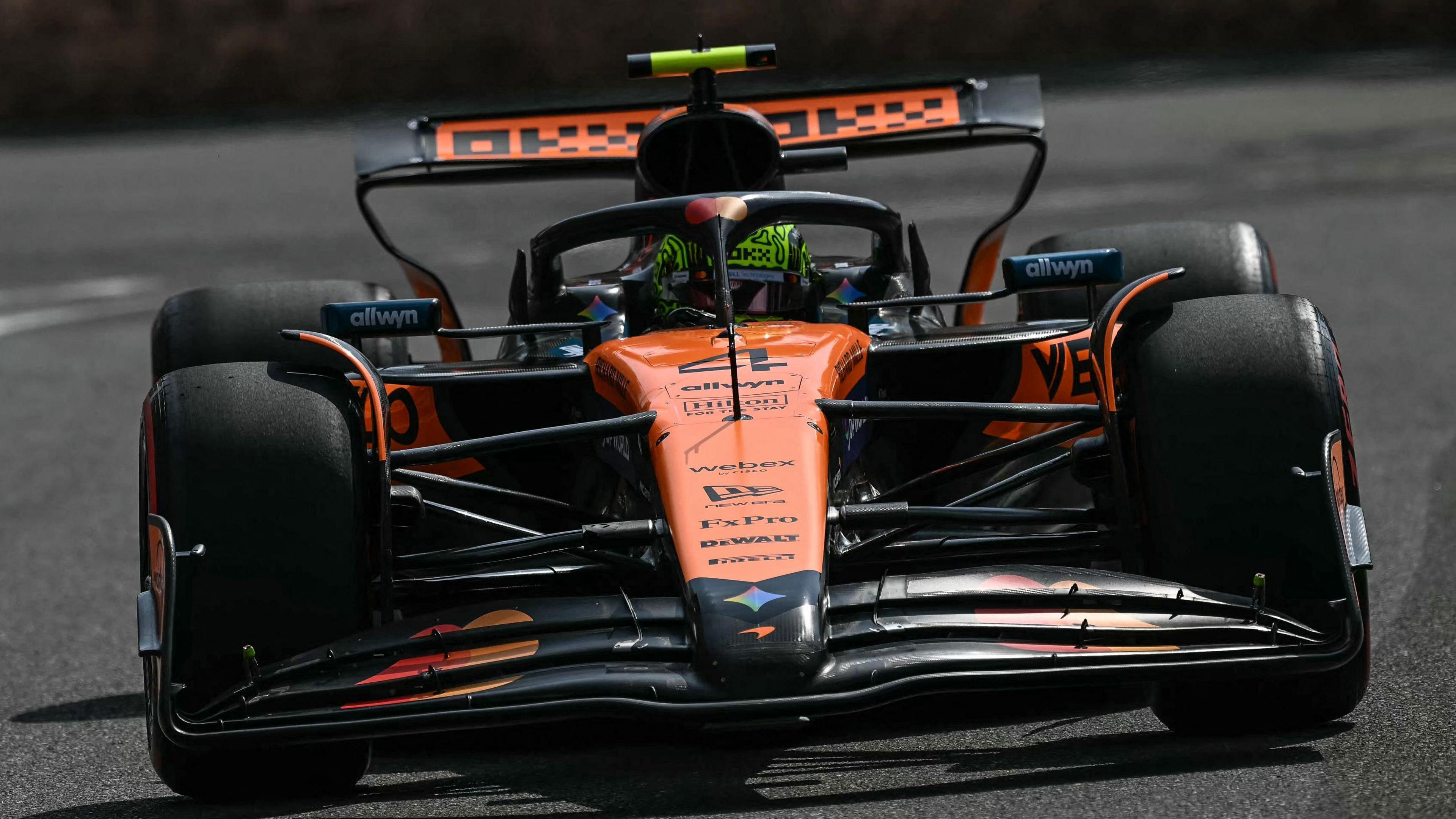 Norris tops Azerbaijan practice as McLaren pair lead, kerb incident halts session
