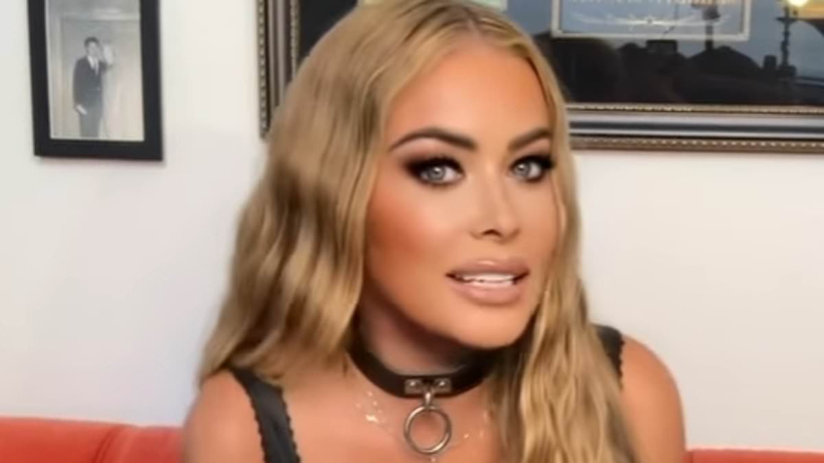 Carmen Electra sizzles in kinky dog-collar look as she teases new home move