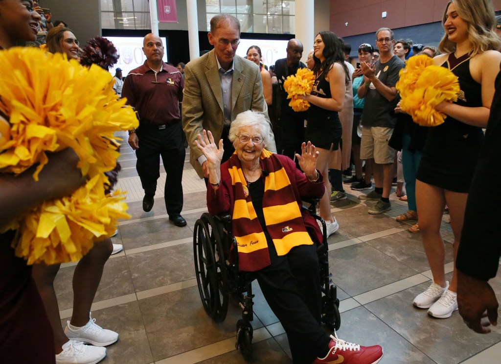 Sister Jean waves at a Loyola Chicago event