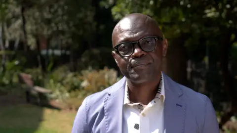 School cook serving vegetarian meal