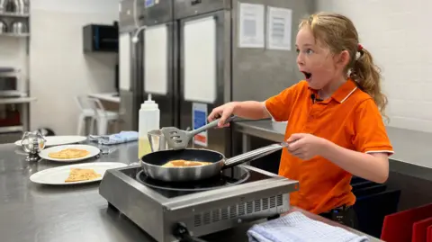 Seven-year-old Jersey fundraiser helps raise £2,500 for food poverty charity