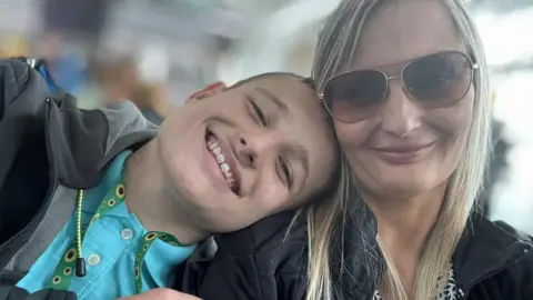 Autistic teen faces quitting school after taxi funding cut