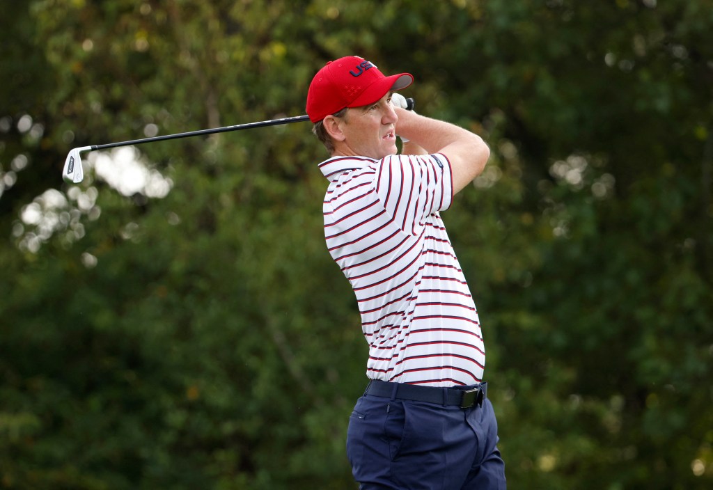 Colin Jost with Eli Manning at the Ryder Cup celebrity match