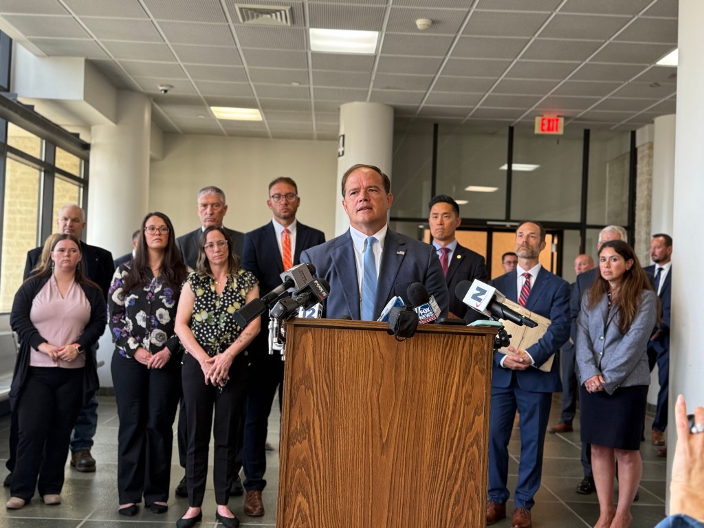 Long Island prosecutors outside the courthouse