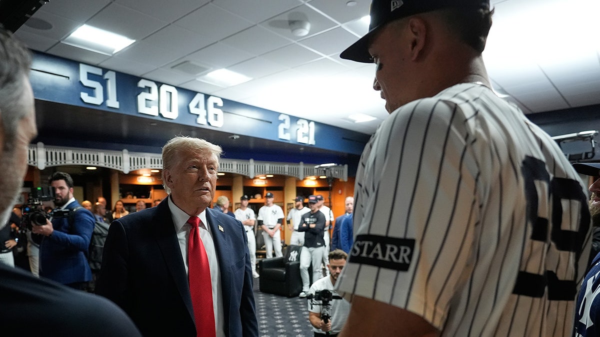 Trump greets Judge before the game