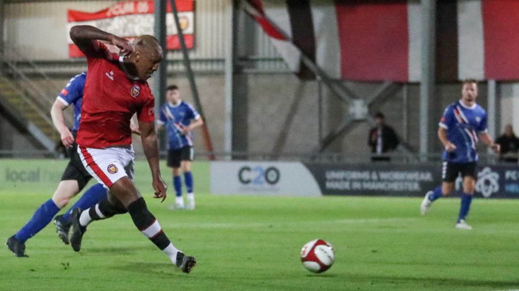 Wisdom playing for FC United