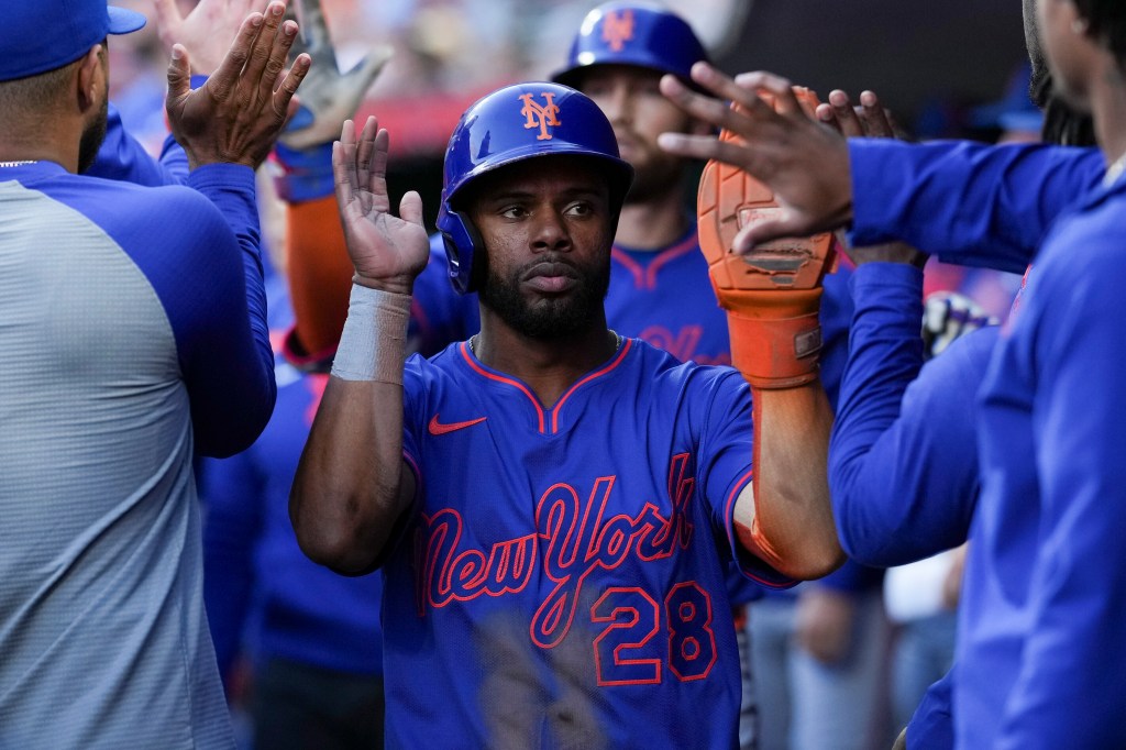 Cedric Mullins celebrates after scoring during the Mets’ Sept. 6 game
