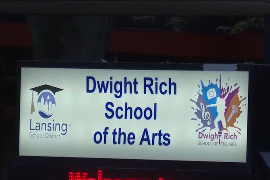 Sakir Everett's mother at a board meeting