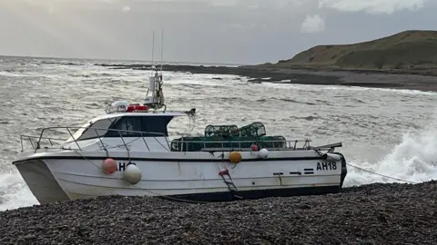 Sole occupant of creel boat still missing after vessel washes ashore in Aberdeenshire